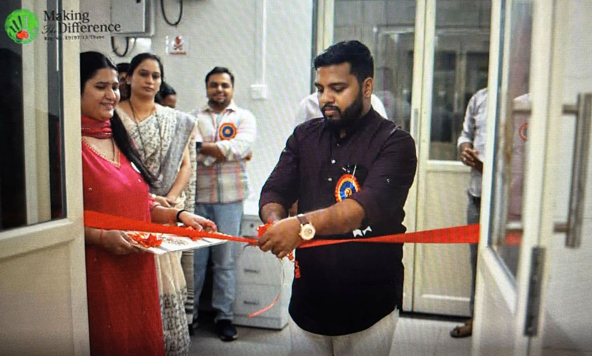 My picture of cutting red ribbon for an inauguration in a hospital ward